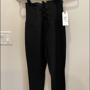 Black trousers with lace strings